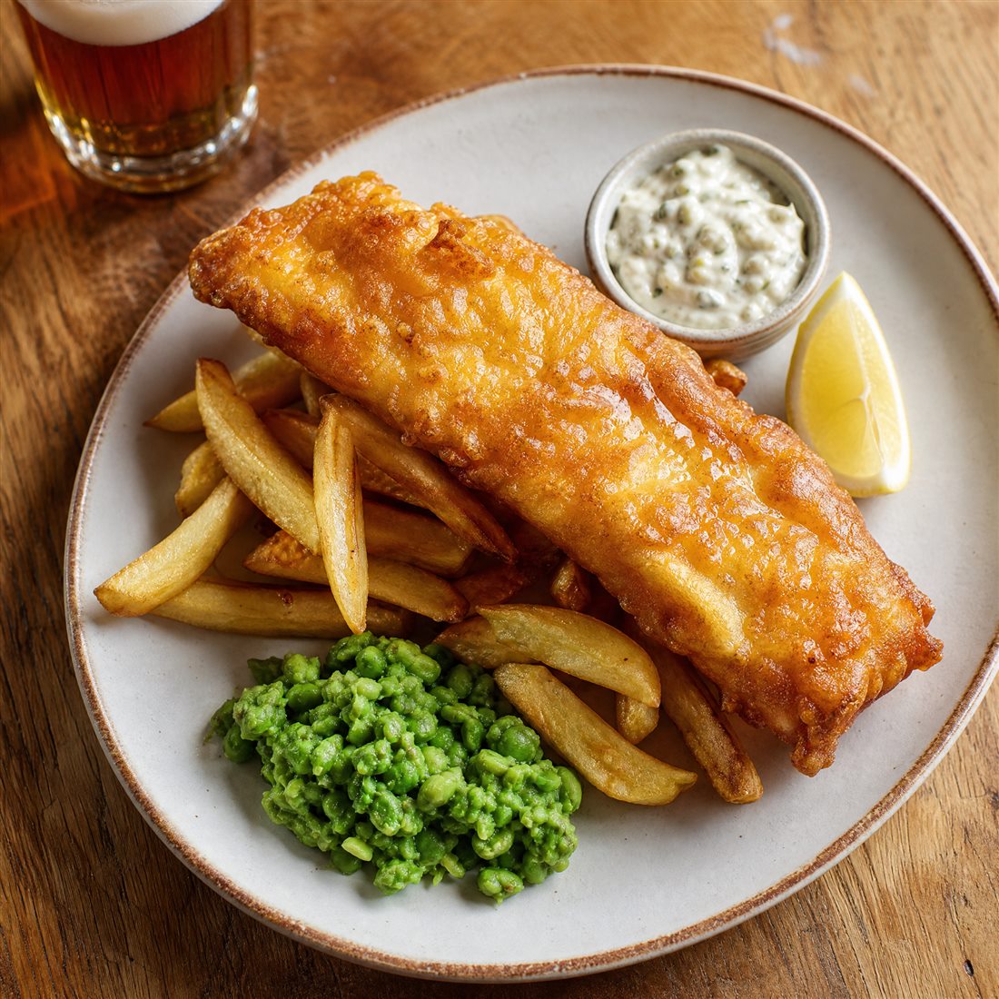 Beer battered haddock with hand-cut chips concept